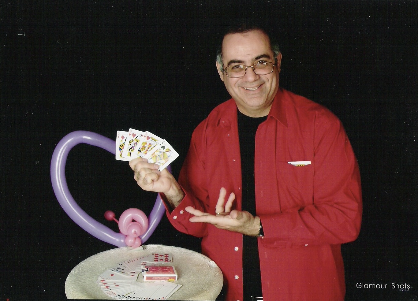 David Moneypenny with balloon art and cards